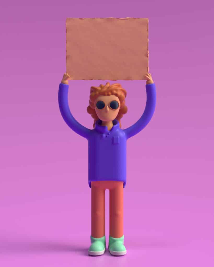 3D figurine holding a sign